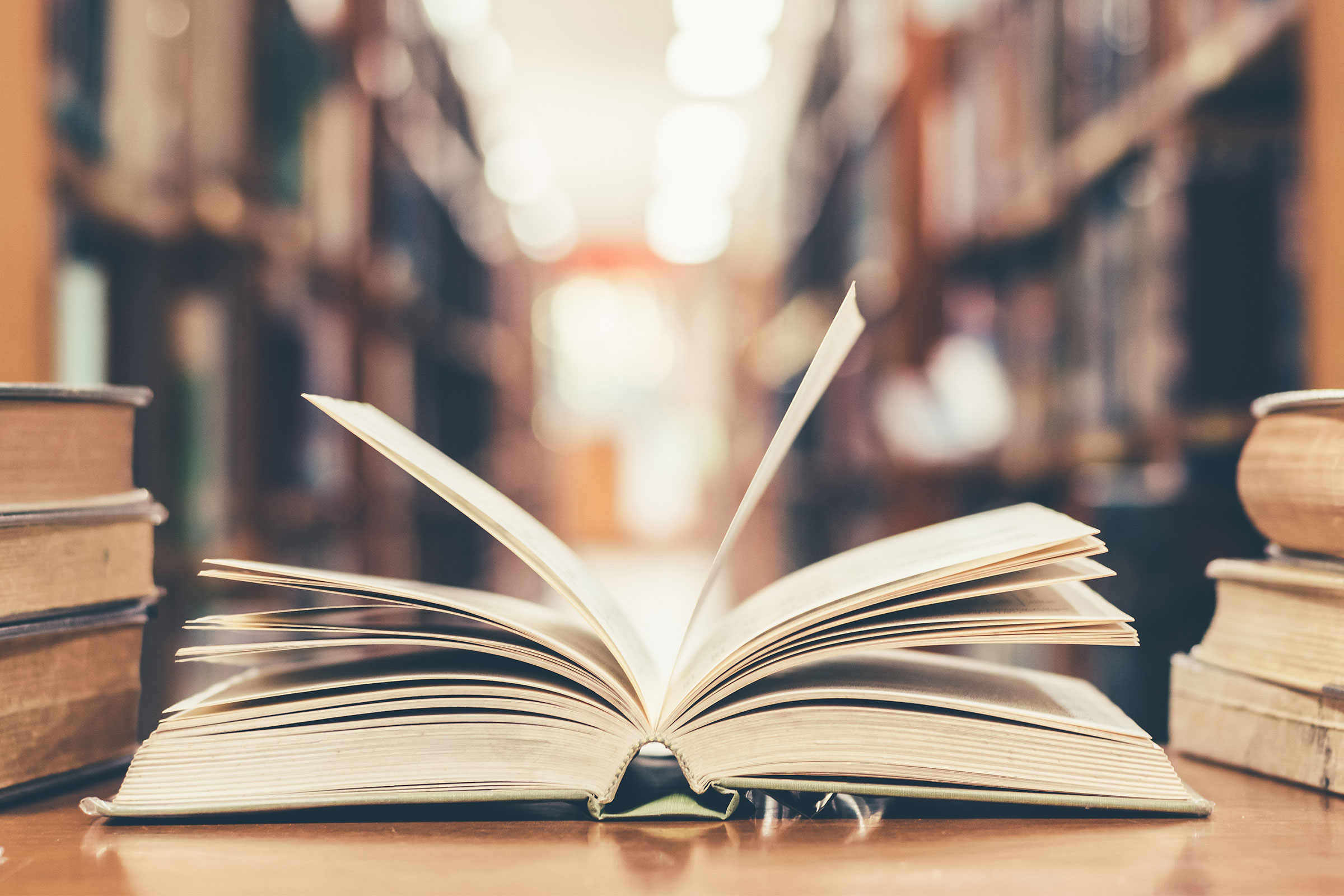 Open book on library desk